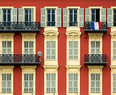 House in Nice with french flag on a balcony photo