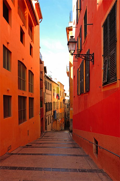 Typical old architecture with traditional colors in Nice France photo